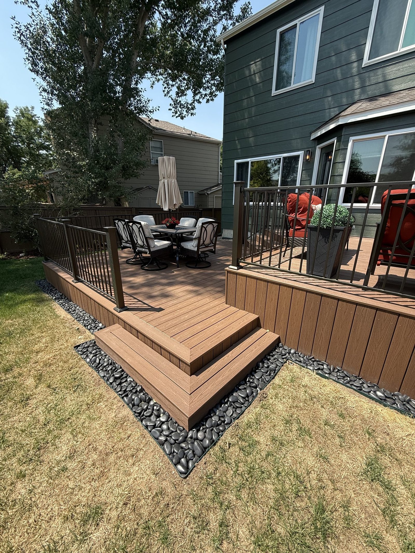 Close view of deck stair and fascia showing the picture frame board